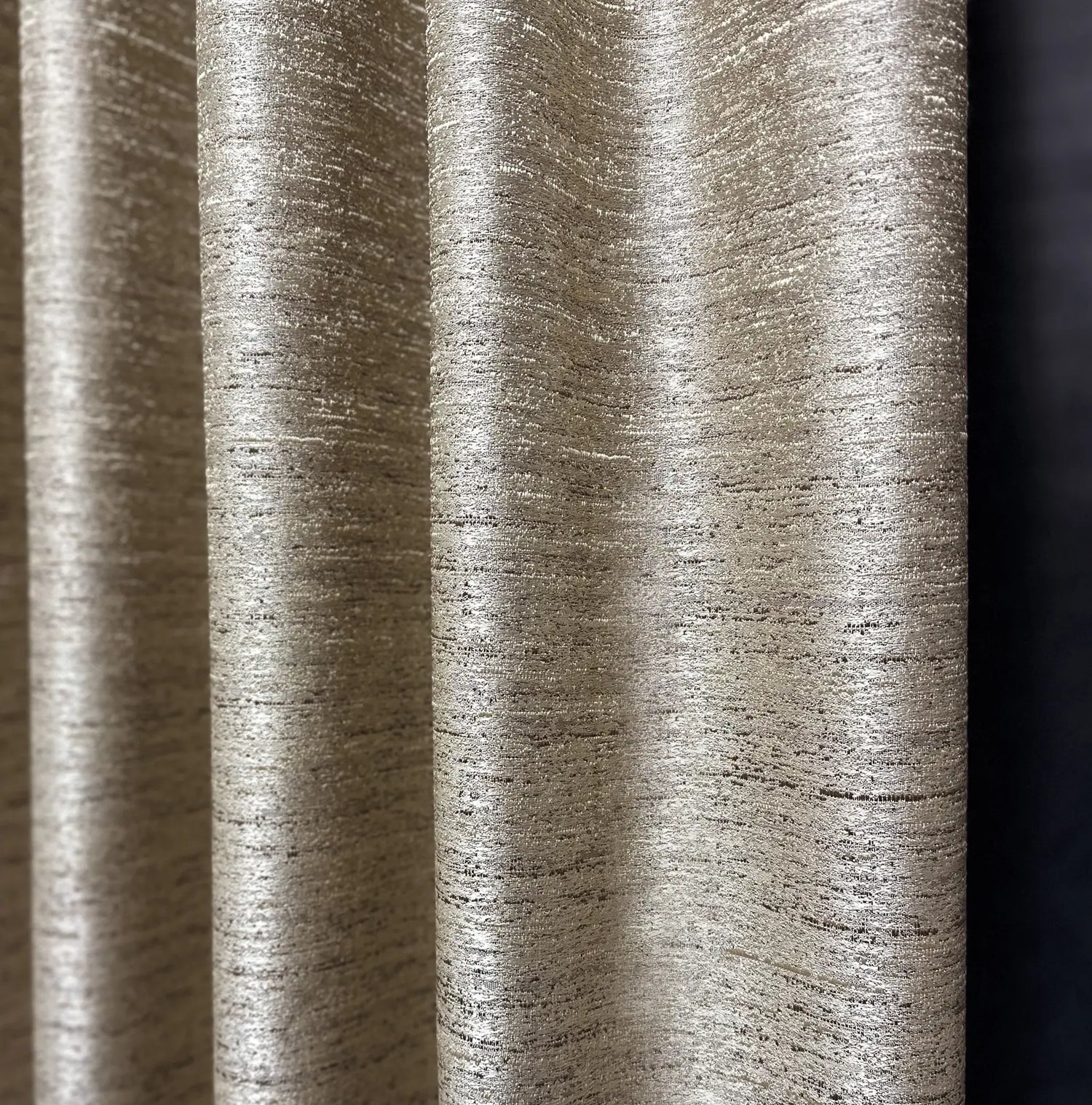 Close-up of textured  fabric with a dark background