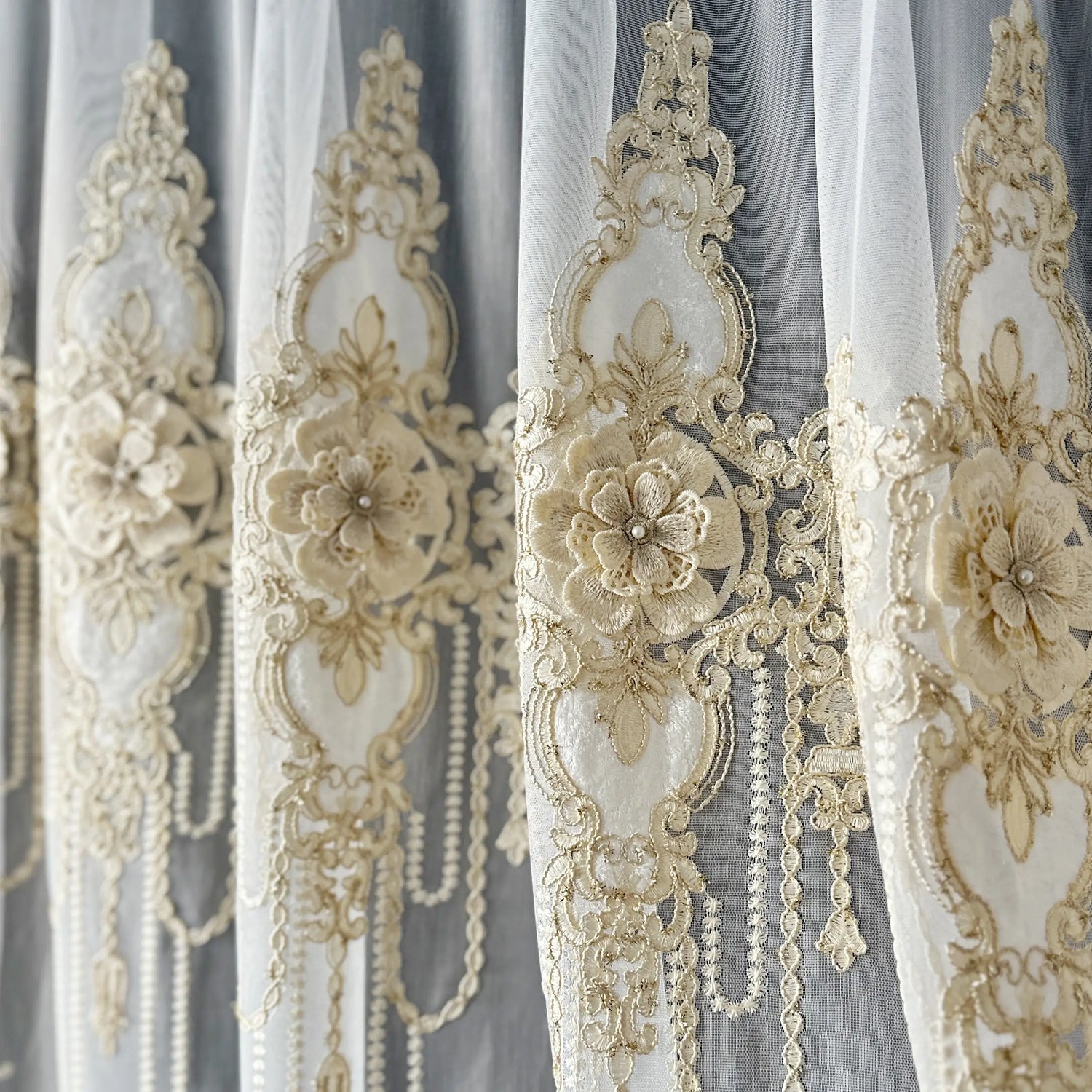 Decorative curtains with gold lace and floral patterns