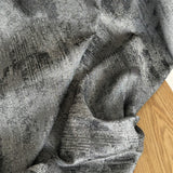 Modern gray jacquard curtains with abstract textured pattern and luxury fabric