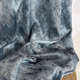 Blue gray jacquard curtain fabric sample with modern abstract shimmering texture