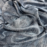 Blue gray jacquard curtain fabric sample with modern abstract shimmering texture