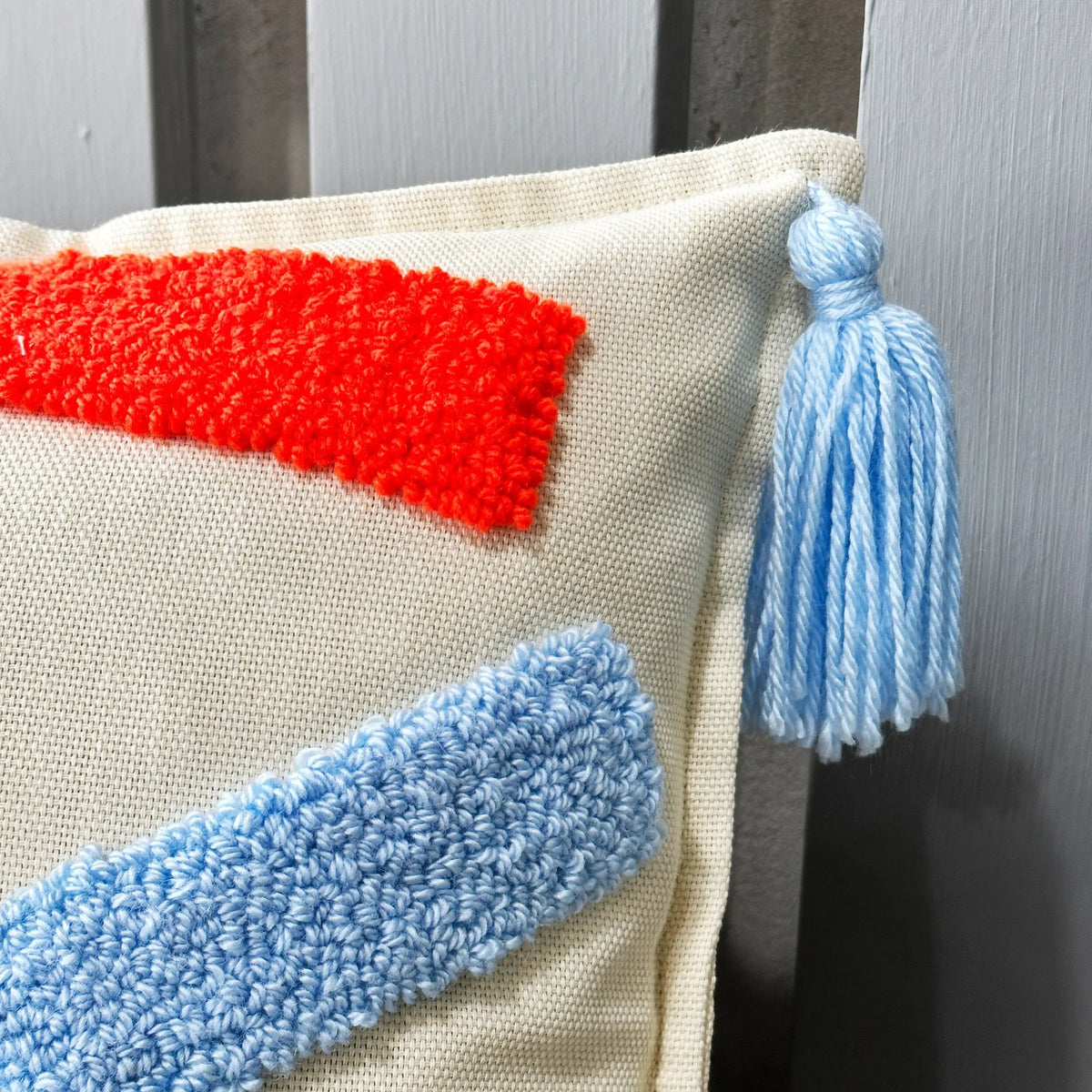 Pillow Cover with blue Tassels punch needle