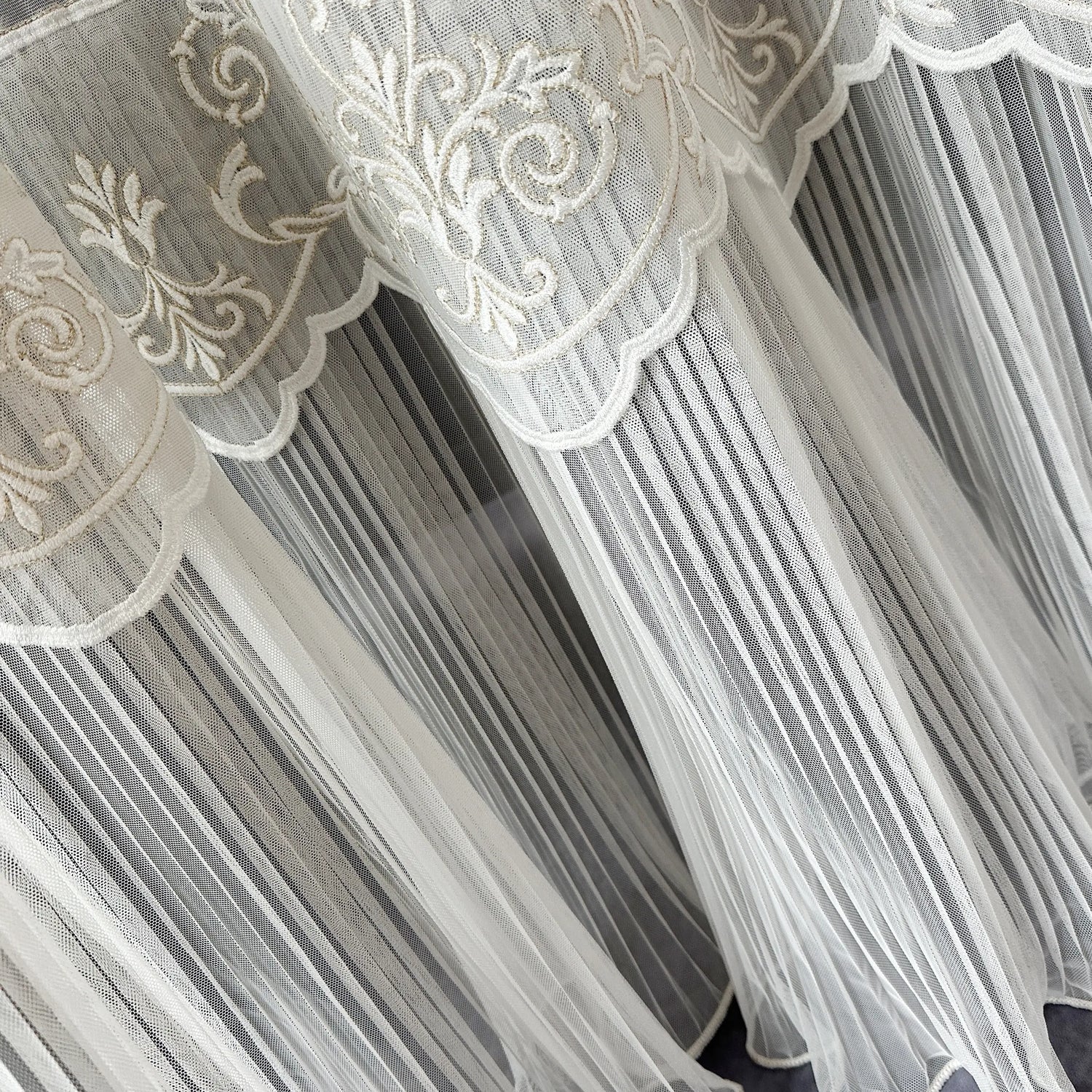 Decorative sheer curtain with intricate lace ruffle detailing