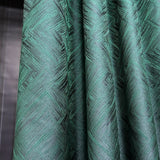 Close-up of green textured fabric with a pattern