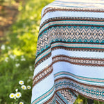 Patterned fabric with a blurred natural background