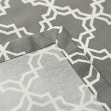 Close-up of gray fabric with white geometric pattern