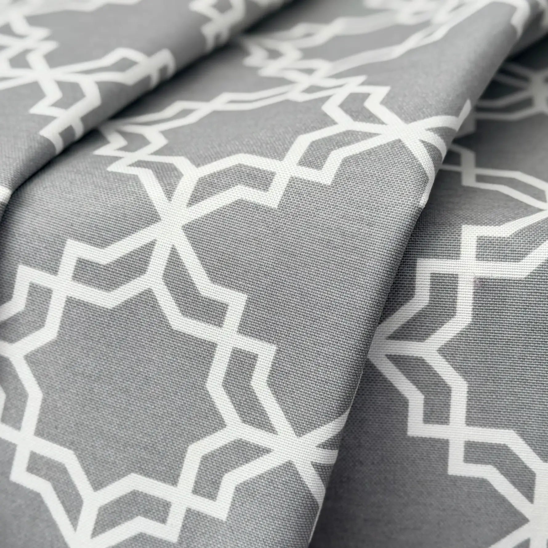 Gray fabric with white geometric pattern