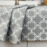 Gray geometric patterned fabric on a white surface