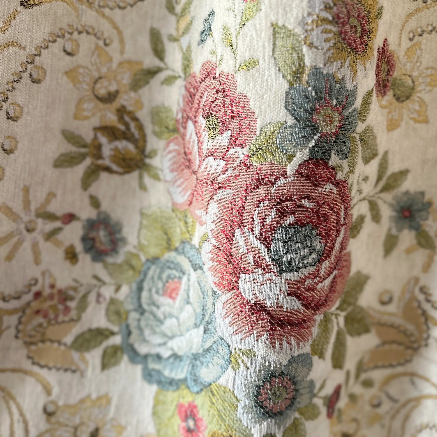Close-up of embroidered floral pattern on fabric