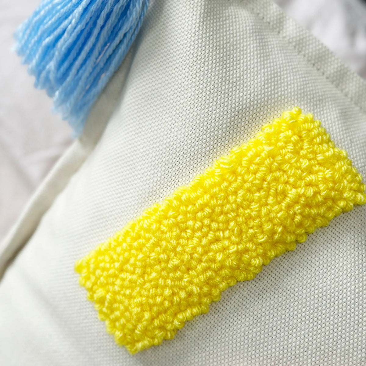 Pillow Cover with Tassels punch needle close ip photo