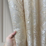 Ivory beige jacquard curtain fabric sample with floral damask texture