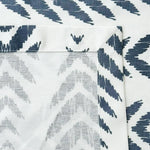 Fabric with blue and gray abstract pattern on a white background