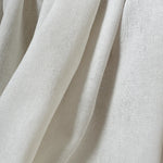 Close-up of beige fabric with visible texture