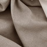 Close-up of beige fabric with a textured pattern