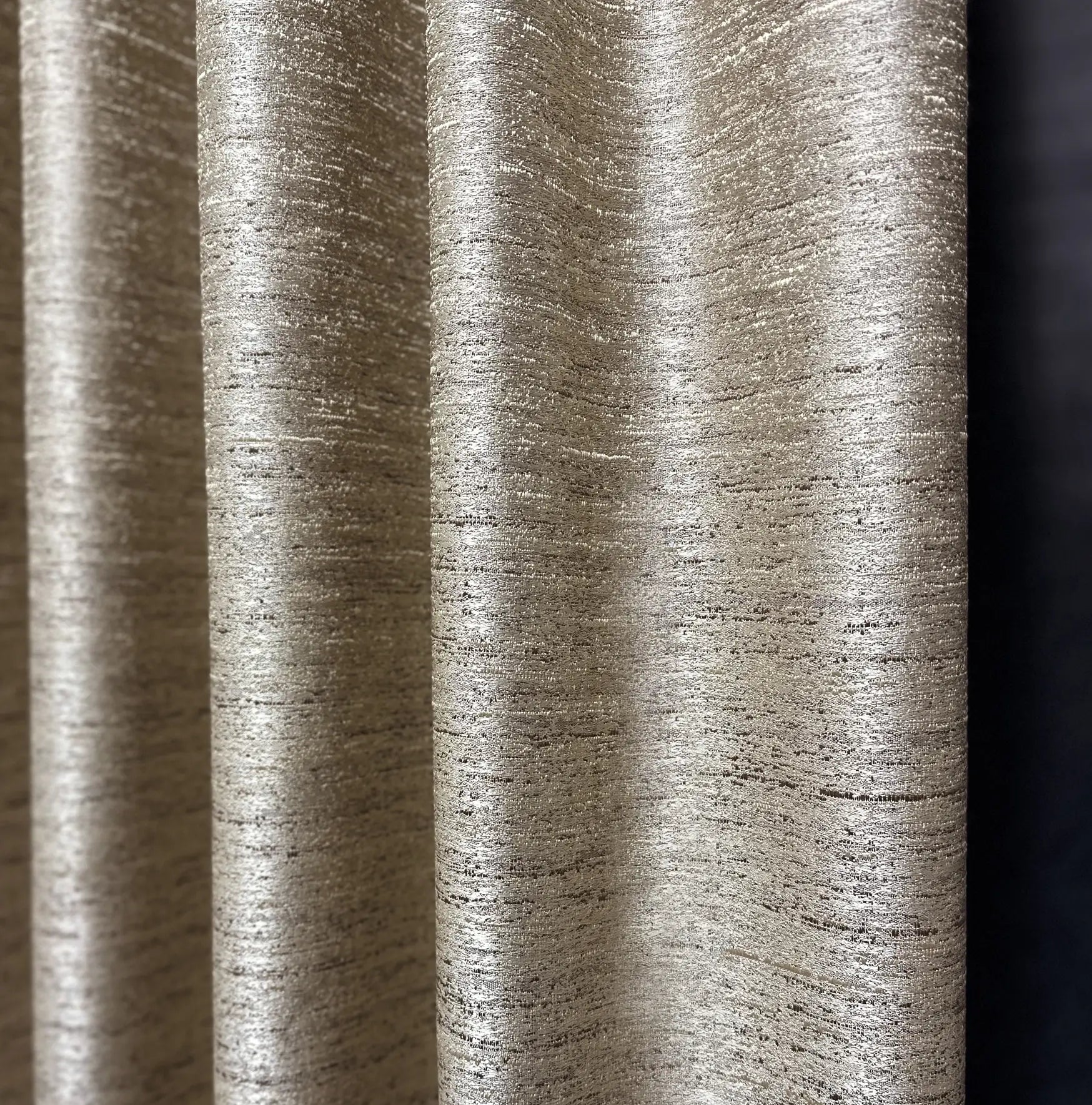 Close-up of textured  fabric with a dark background
