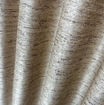 Close-up of textured fabric with a neutral color palette