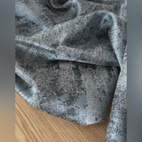 Blue gray jacquard curtain fabric sample with modern abstract shimmering texture