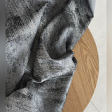 Modern gray jacquard curtains with abstract textured pattern and luxury fabric