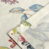 Close-up of floral fabric swatches with a patchwork pattern.