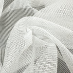 Close-up of white mesh curtains fabric with a grid pattern