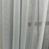 Close-up of a textured gray curtain pet friendly
