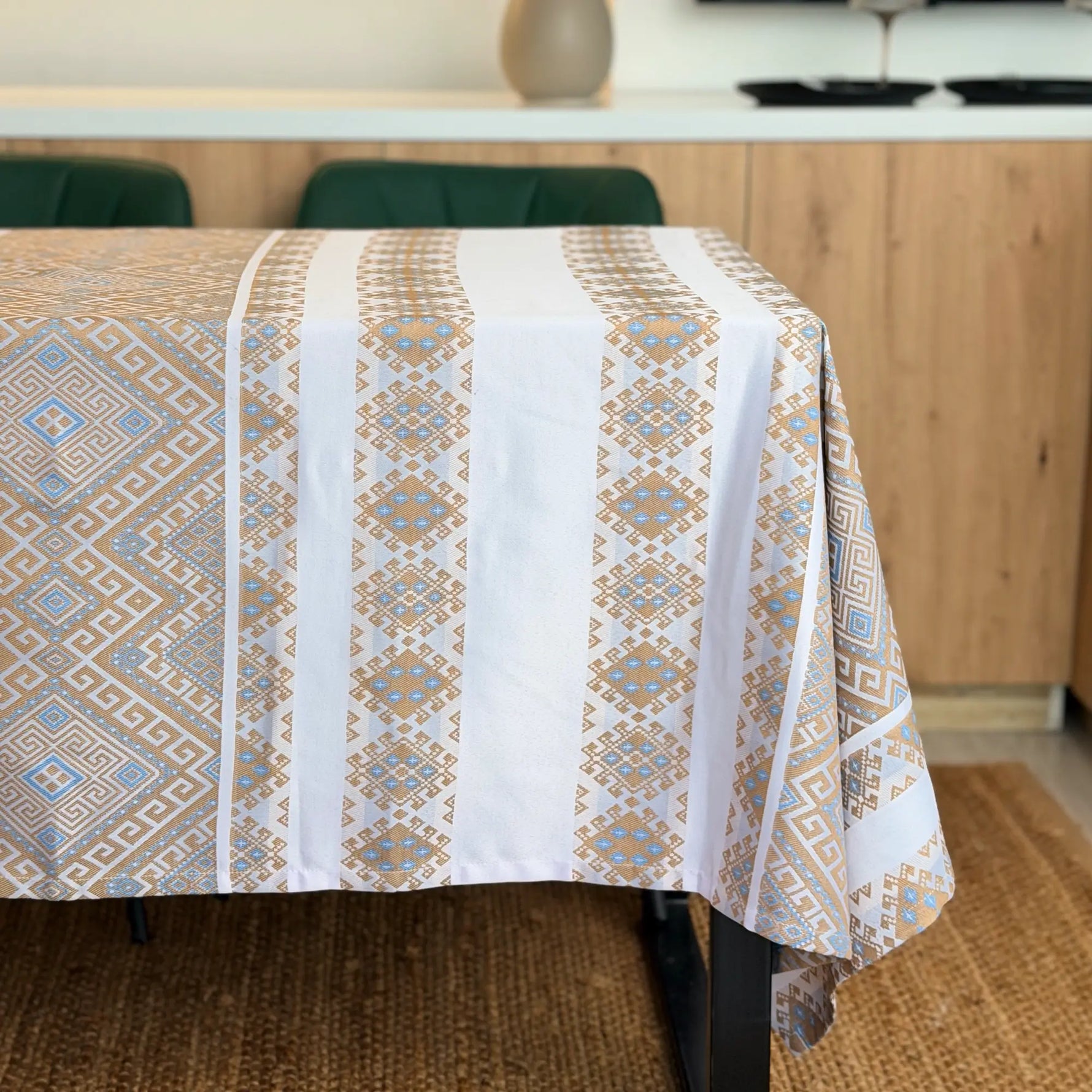 Tablecloth with geometric pattern on a dining table in a kitchen setting