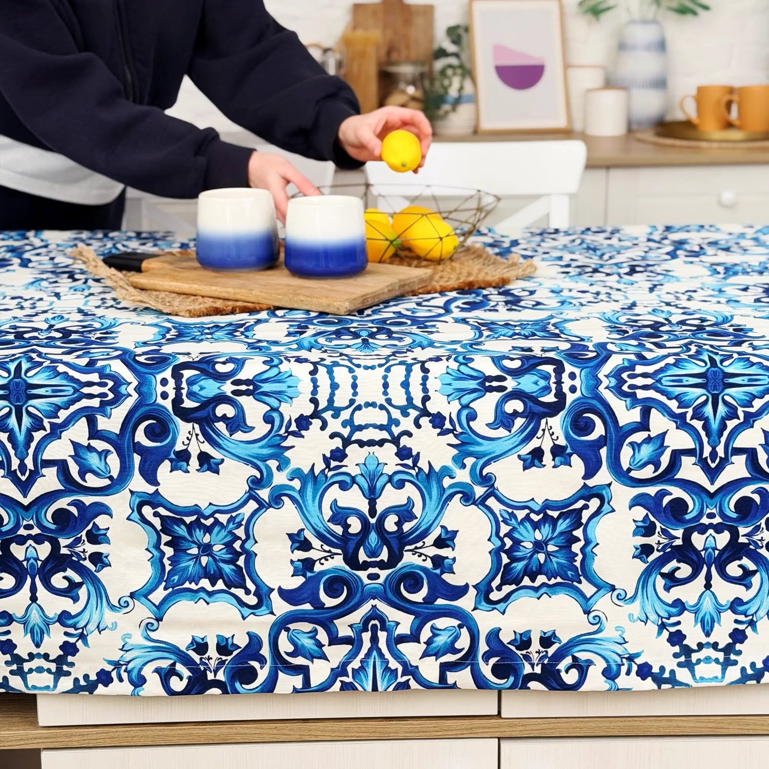 Tablecloth with blue and white pattern on a table in a kitchen setting